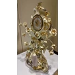 Ceramic clock with roses.