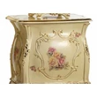 Small angular ceramic chest of drawers with roses, with wooden legs. Color: cream color, gold