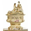 Oval ceramic bonbonier with couple. Color: cream color, gold
