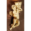Suspended ceramic angel.