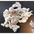 Cloud-shaped ceramic ornament with angels, painted ceramic.