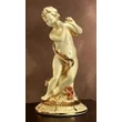 Ceramic table angel sculpture with flowers, painted porcelain