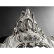 Ceramic mirror with angels.