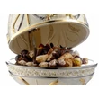 Small egg-shaped ceramic container with built-in piston. Color: cream color, gold, platinum