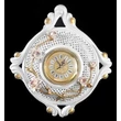 Ceramic wall clock with flowers.