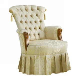 Dolly armchair with decorative skirt