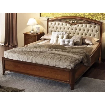 Nostalgia franciaágy keret ágyneműtartóval, hajlított oldallal, íves fejvégű fémbetétes díszráccsal és capitoné behúzással, alacsony lábvéggel - dió