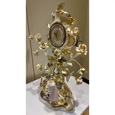 Ceramic clock with roses.