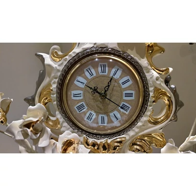 Ceramic clock with roses.