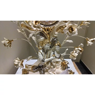 Ceramic clock with roses.