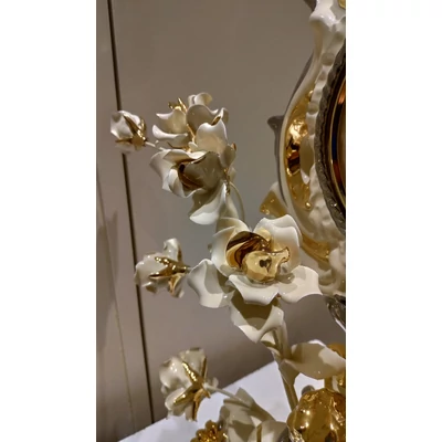 Ceramic clock with roses.