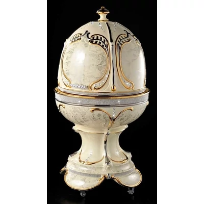 Egg-shaped ceramic container with openable top, with wheels, with built-in piston and with lighting.