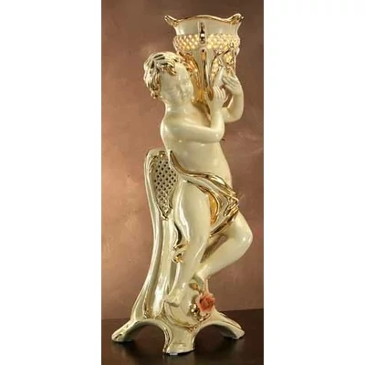 Ceramic angel with lamp.