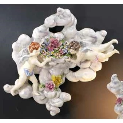 Cloud-shaped ceramic ornament with angels, painted ceramic.
