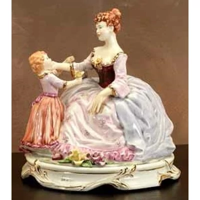 Ceramic mother with child, painted porcelain