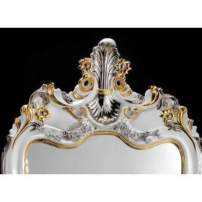 Ceramic mirror with 2 angels with flower.