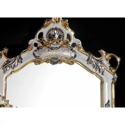 Ceramic mirror with angels.