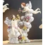 Cloud-shaped ceramic ornament with angels and with lamp, painted ceramic.