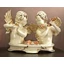 Angel couple ceramic bust sculpture with flowers. Color: cream color, gold